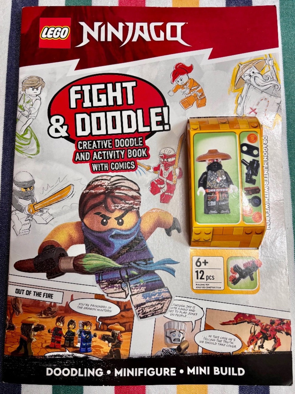 LEGO "NINJAGO - Fight & Doodle Softcover book with Dragon HUNTER minifigure"